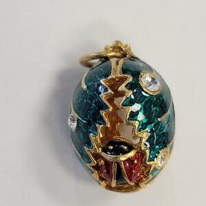 Enamel Egg Shaped Charm Pendant with ladybug and leaves